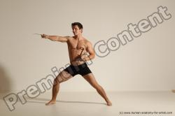 Underwear Fighting with axe Man White Muscular Short Brown Dynamic poses Academic